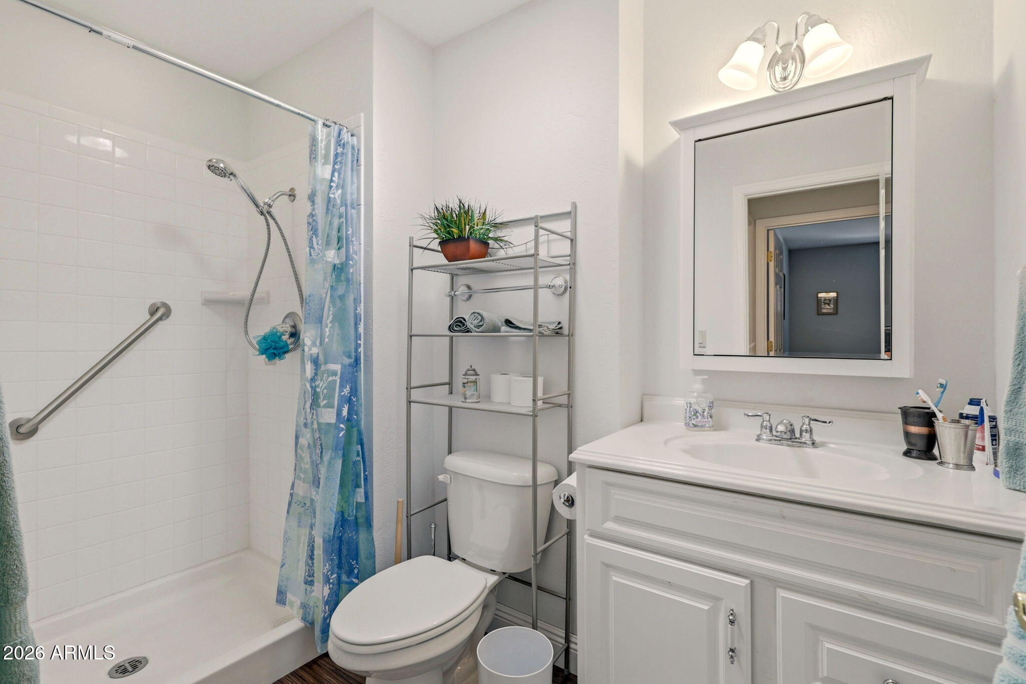 2746 Pineview Court Overgaard, AZ 85933 - Photo 22 of 30 a bathroom with a sink a toilet and shower