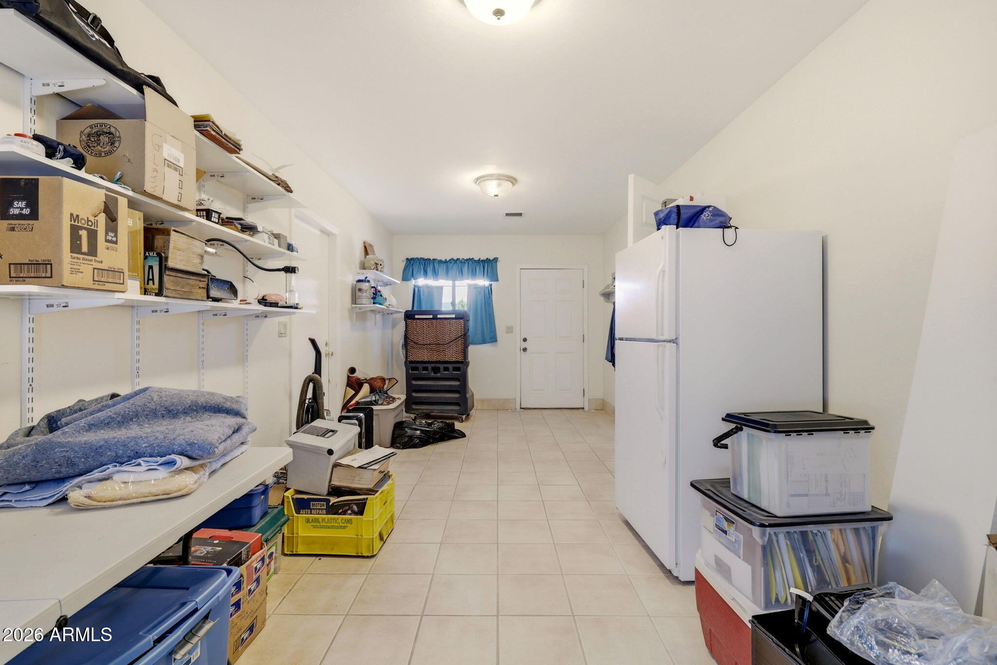2746 Pineview Court Overgaard, AZ 85933 - Photo 24 of 30 a room with storage and utility