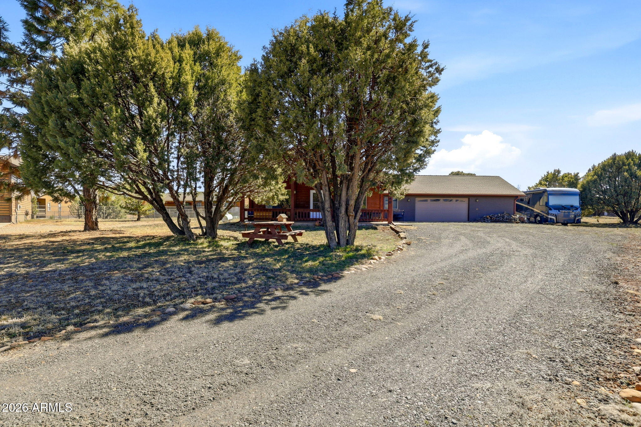 2746 Pineview Court Overgaard, AZ 85933 - Photo 5 of 30 a view of road with trees