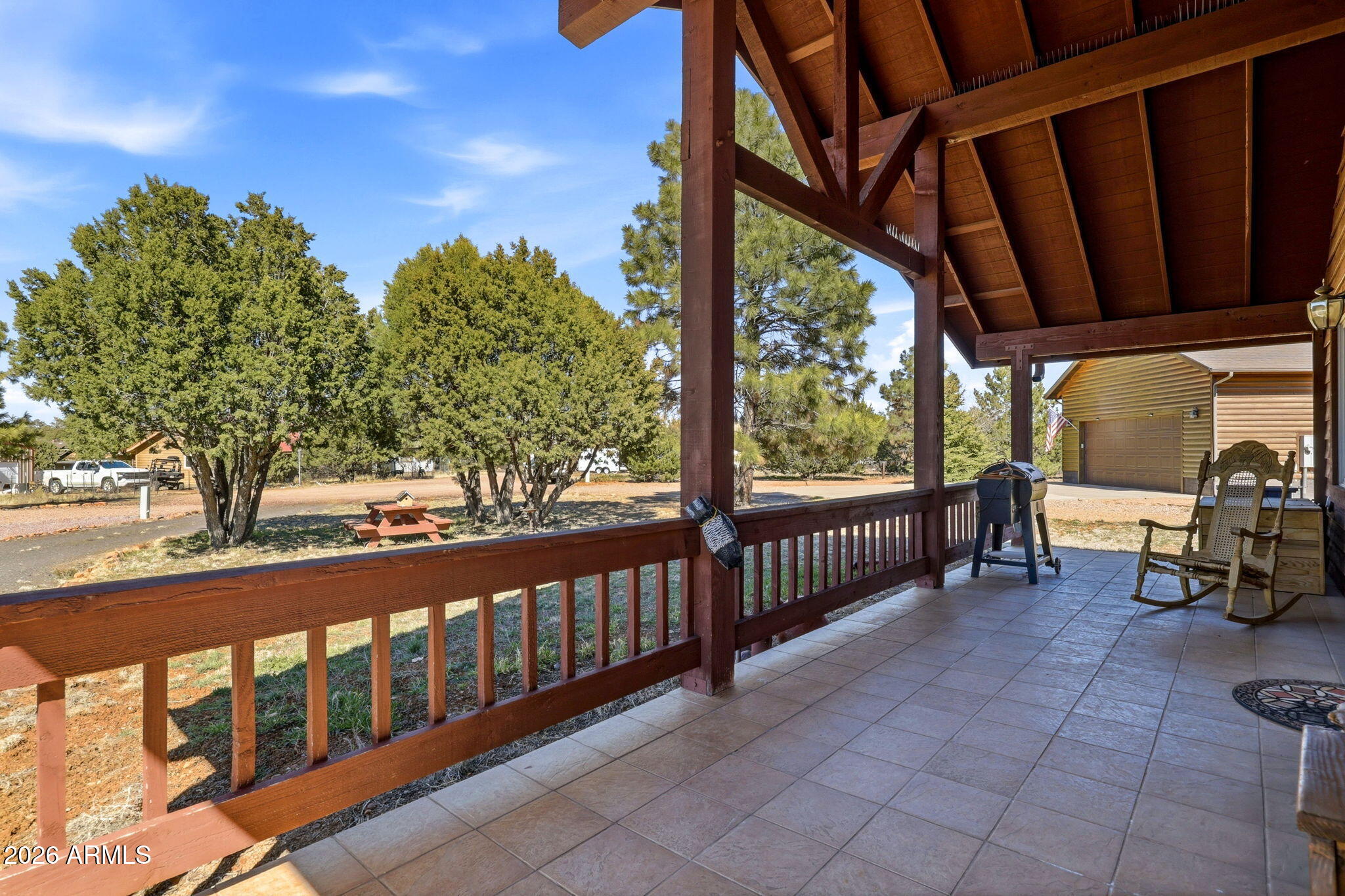 2746 Pineview Court Overgaard, AZ 85933 - Photo 6 of 30 a view of a porch with furniture
