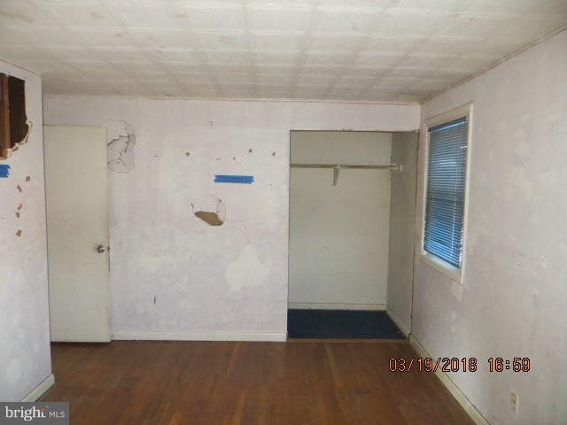 8149 Del Haven Road Baltimore, MD 21222 - Photo 8 of 18 a view of an empty room