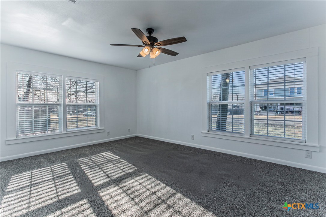 301 Thomas Street Rogers, TX 76569 - Photo 13 of 29 a view of an empty room with a window