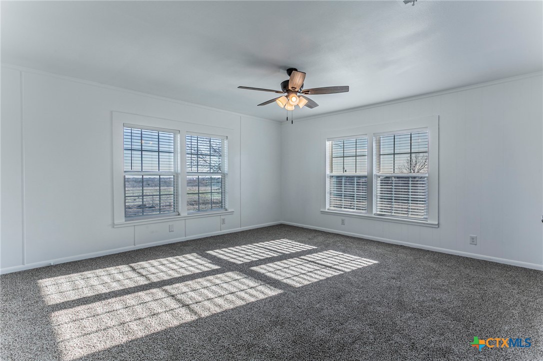 301 Thomas Street Rogers, TX 76569 - Photo 9 of 29 a view of an empty room with a window