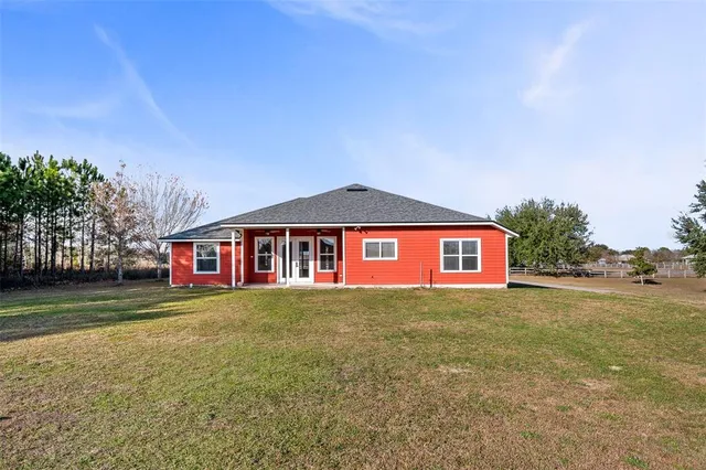 a front view of a house with yard