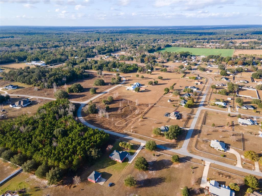 10215 Southwest 98th Avenue Gainesville, FL 32608 - Photo 38 of 39 an aerial view of residential houses with outdoor space