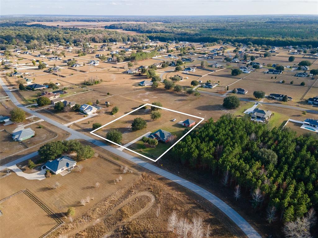 10215 Southwest 98th Avenue Gainesville, FL 32608 - Photo 5 of 39 an aerial view of a city