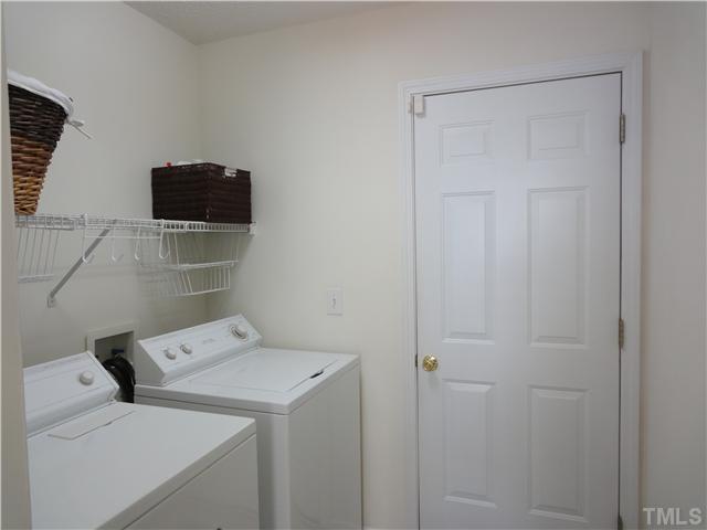 4621 Drewbridge Way Raleigh, NC 27604 - Photo 11 of 25 Laundry room comes right off double car garage which makes a great mud room for the family.