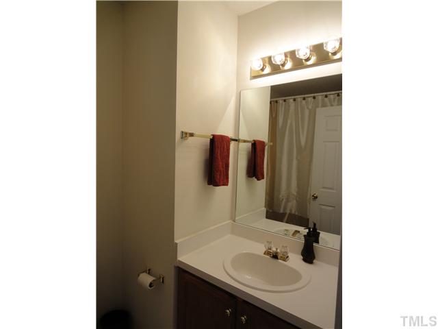 4621 Drewbridge Way Raleigh, NC 27604 - Photo 17 of 25 Hall bathroom with tub & shower.