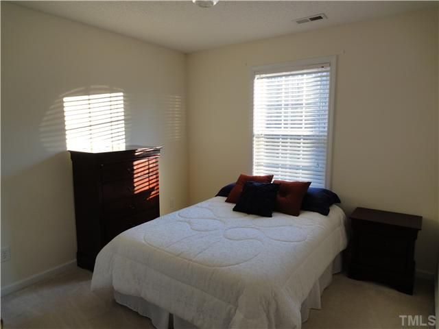 4621 Drewbridge Way Raleigh, NC 27604 - Photo 19 of 25 The fourth bedroom is ready for your wall hangings!