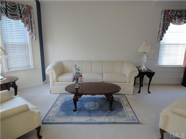 4621 Drewbridge Way Raleigh, NC 27604 - Photo 2 of 25 Welcome your guests into this spacious living room. Pictures & wall decorations have been removed waiting for your personalization!