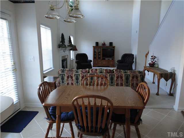 4621 Drewbridge Way Raleigh, NC 27604 - Photo 7 of 25 Big breakfast room with tile floors adjoins kitchen & opens to family room.