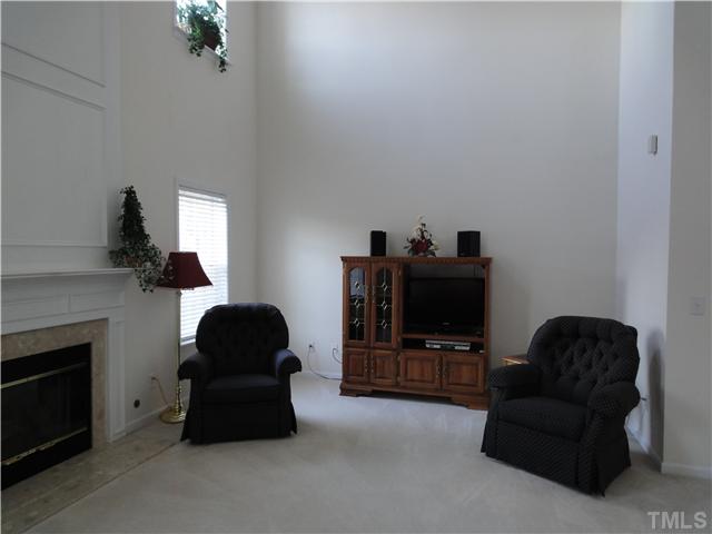 4621 Drewbridge Way Raleigh, NC 27604 - Photo 9 of 25 Windows from second story always keep this room bright & cheerful.