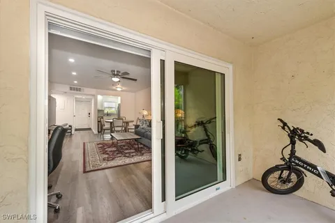 a view of a hallway view with staircase