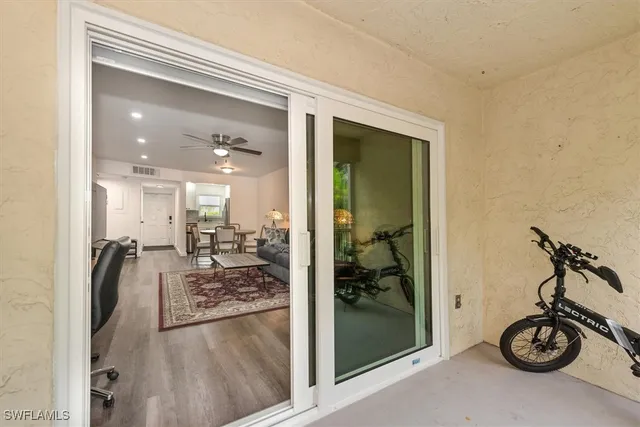 a view of a hallway view with staircase