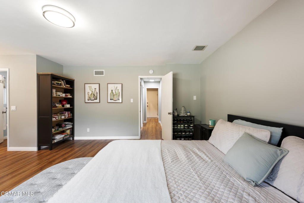 2125 Yosemite Avenue Simi Valley, CA 93063 - Photo 14 of 31 a bedroom with a bed and a couch