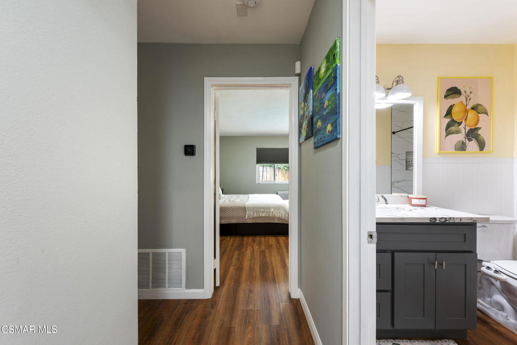 2125 Yosemite Avenue Simi Valley, CA 93063 - Photo 17 of 31 a en suite bathroom with a sink and a mirror