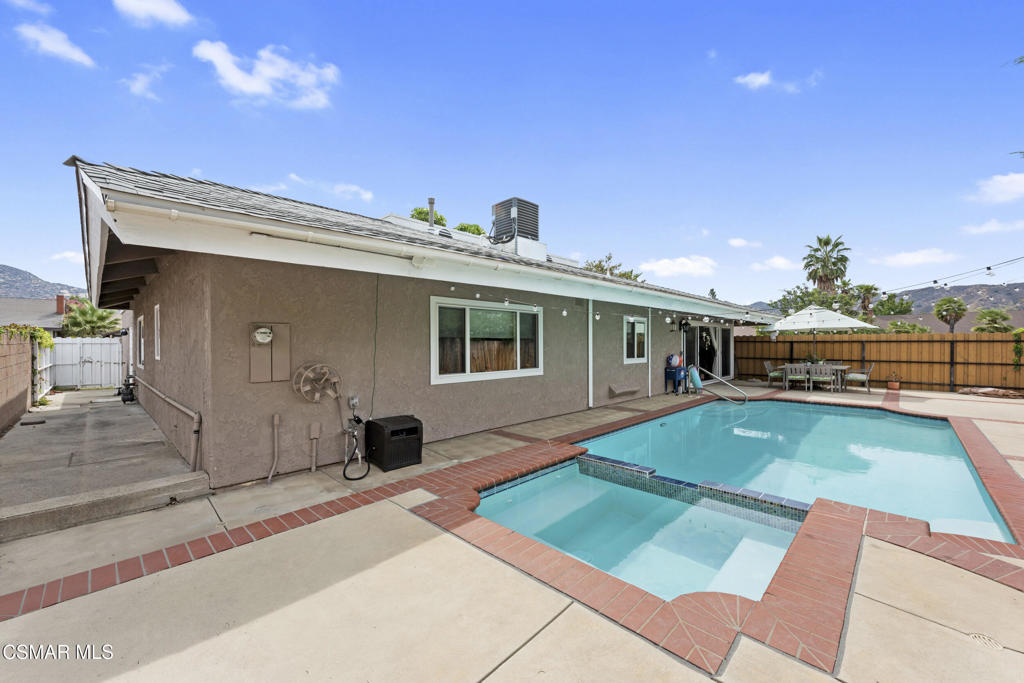 2125 Yosemite Avenue Simi Valley, CA 93063 - Photo 27 of 31 a front view of a house with a garden