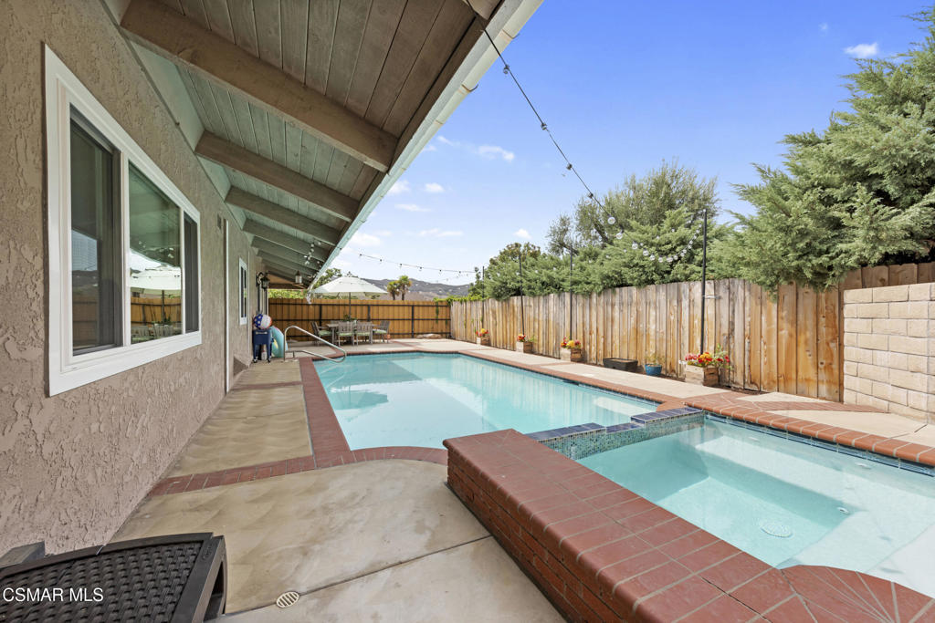 2125 Yosemite Avenue Simi Valley, CA 93063 - Photo 28 of 31 a view of a backyard with sitting area