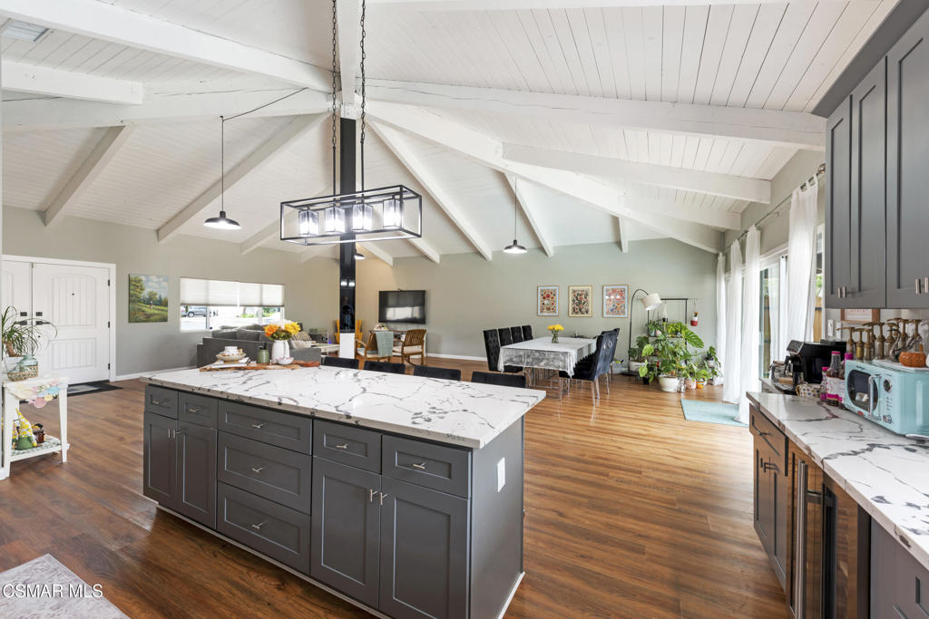 2125 Yosemite Avenue Simi Valley, CA 93063 - Photo 7 of 31 a kitchen with a counter space a sink and cabinets
