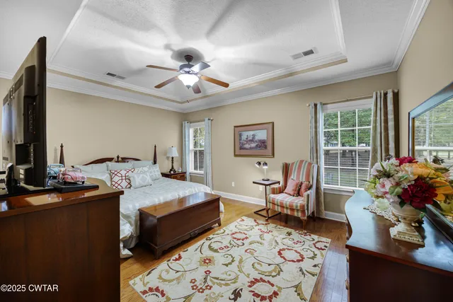 a view of a garden with lawn chairs