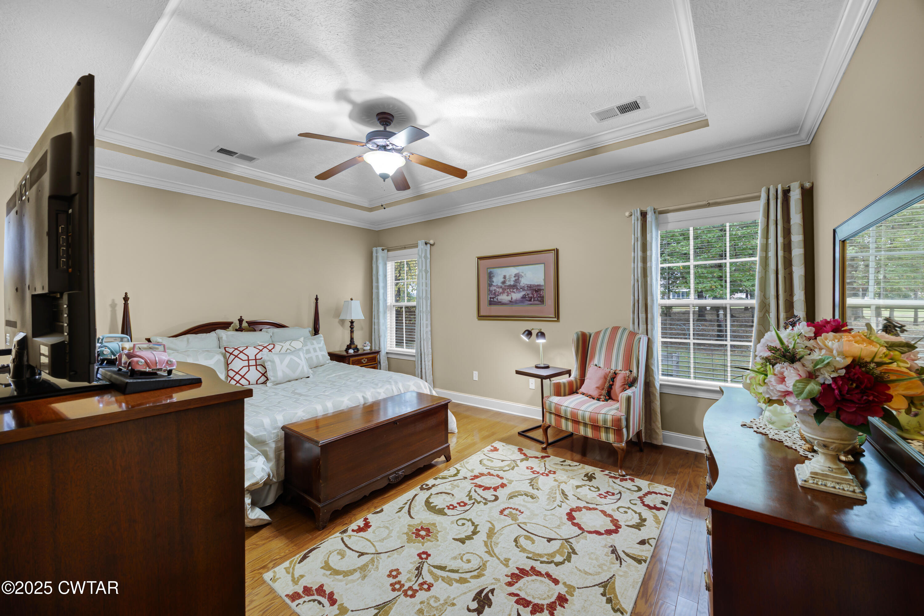 3 Emerald Ridge Cove Jackson, TN 38305 - Photo 17 of 26 a bedroom that has a bed and a dresser in it