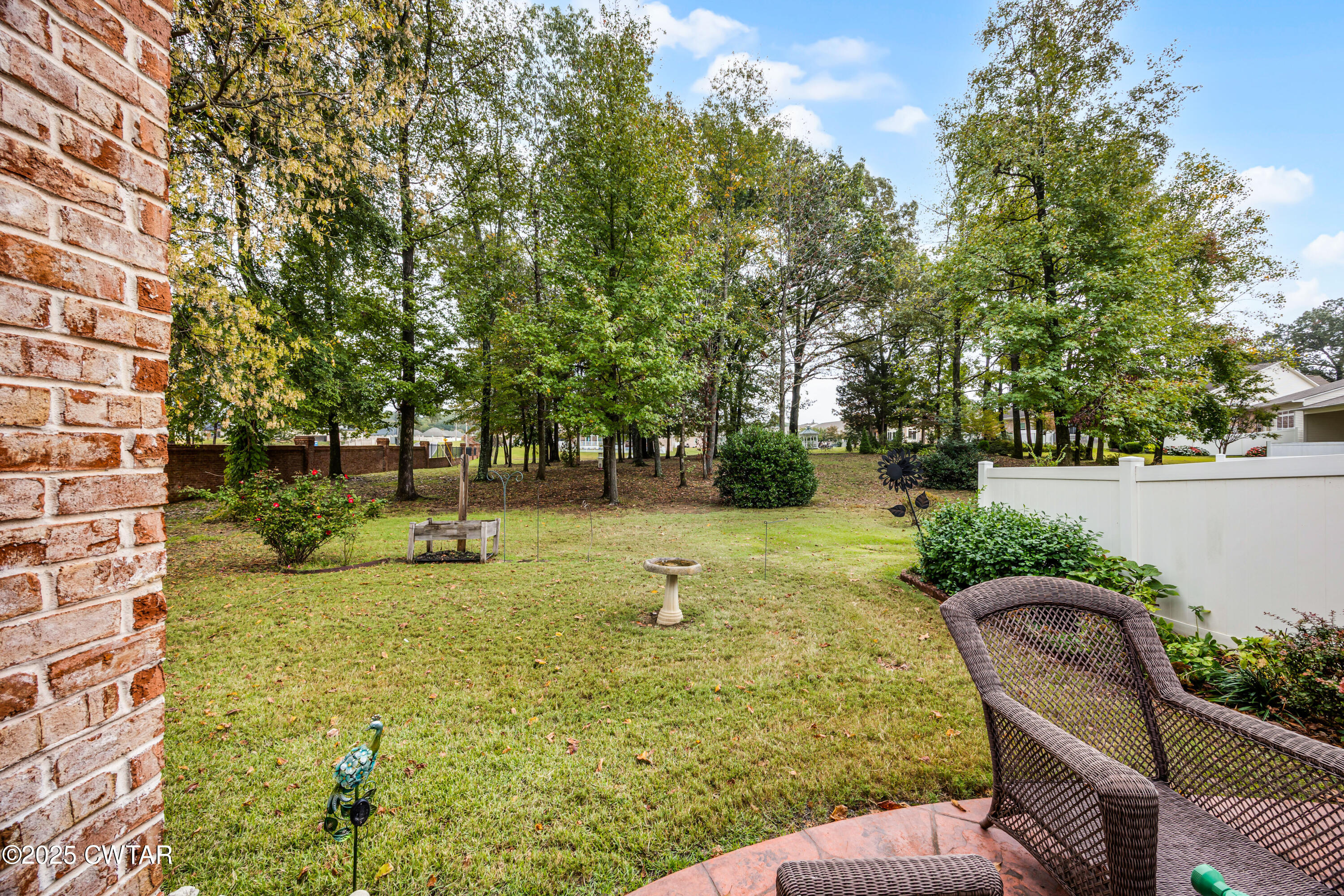 3 Emerald Ridge Cove Jackson, TN 38305 - Photo 18 of 26 a view of a garden with lawn chairs