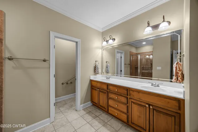 a front view of a house with swimming pool and porch