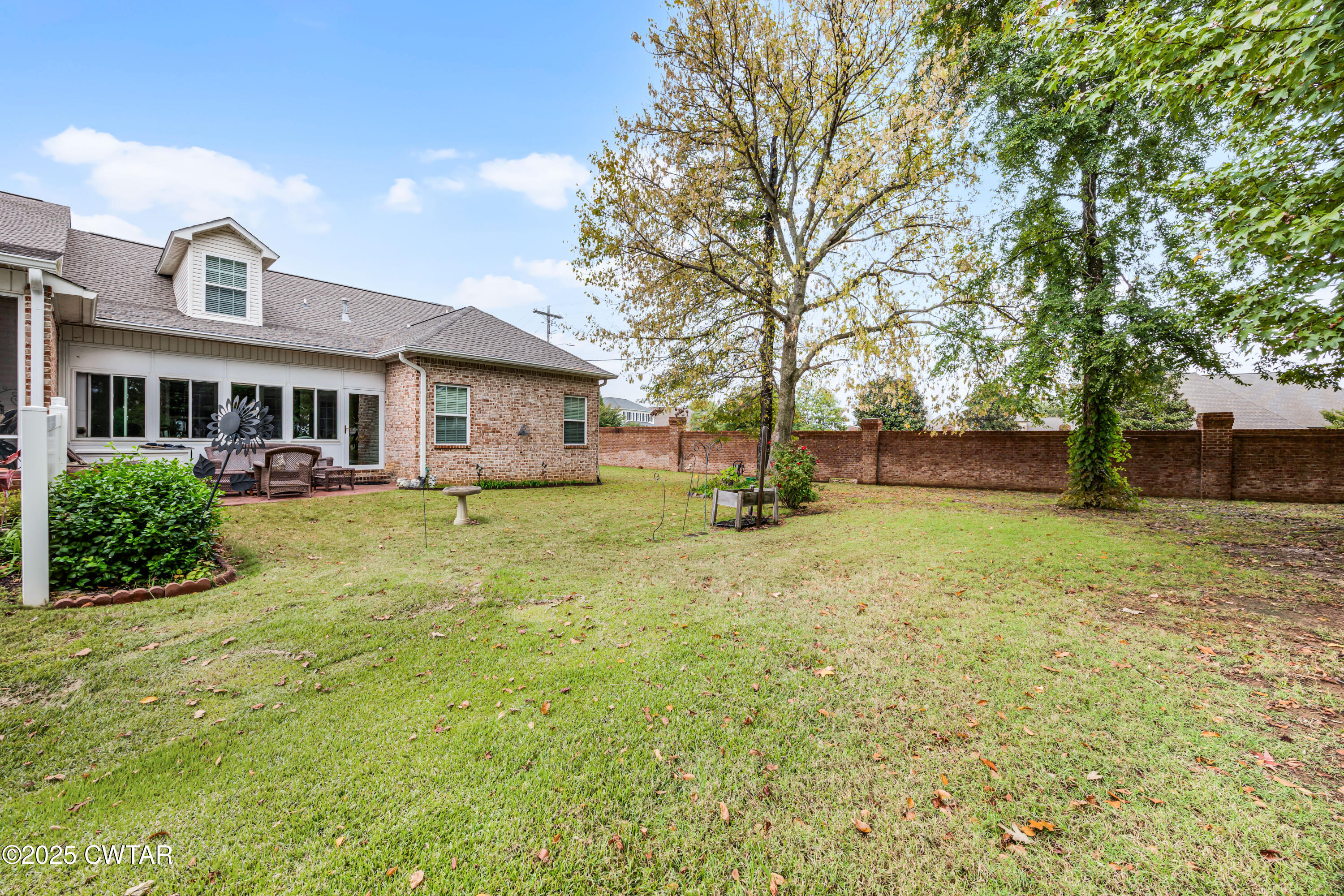 3 Emerald Ridge Cove Jackson, TN 38305 - Photo 22 of 26 a view of a house with a yard