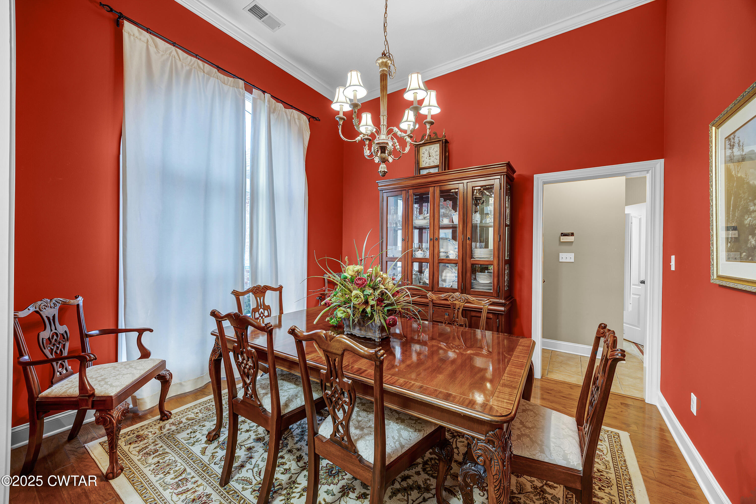3 Emerald Ridge Cove Jackson, TN 38305 - Photo 3 of 26 a view of a dining room with furniture and chandelier