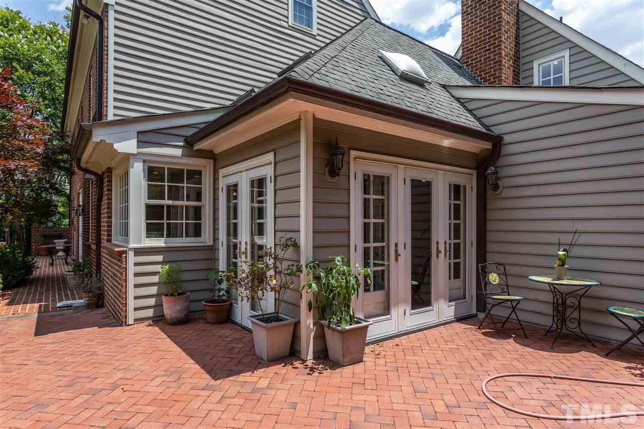 1109 Cowper Drive Raleigh, NC 27608 - Photo 22 of 25 a view of a house with patio