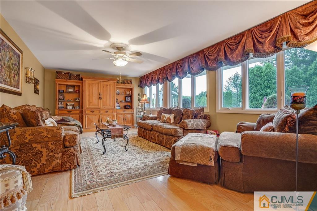 60 Higgins Road Old Bridge, NJ 08857 - Photo 11 of 25 a living room with furniture and a large window
