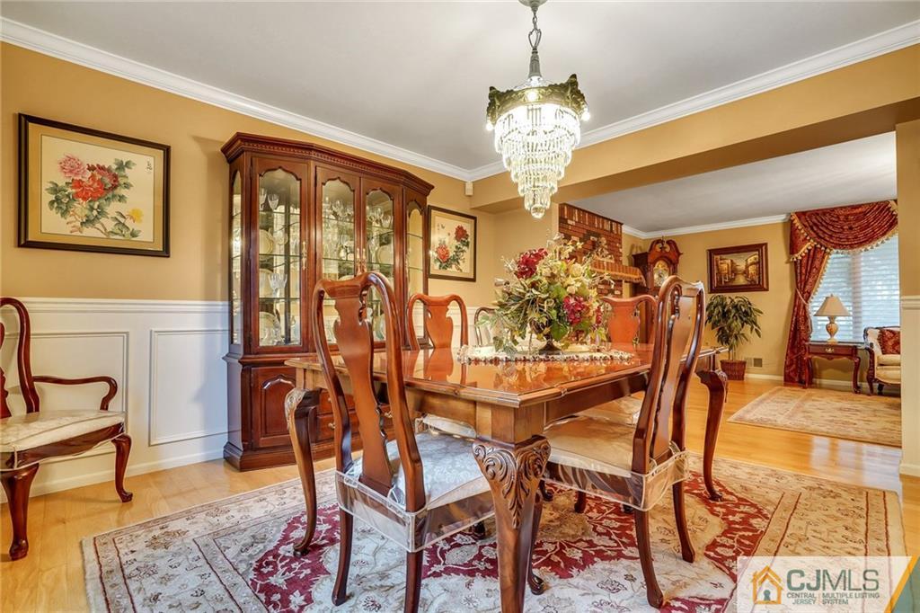 60 Higgins Road Old Bridge, NJ 08857 - Photo 13 of 25 a view of a livingroom with furniture and a chandelier