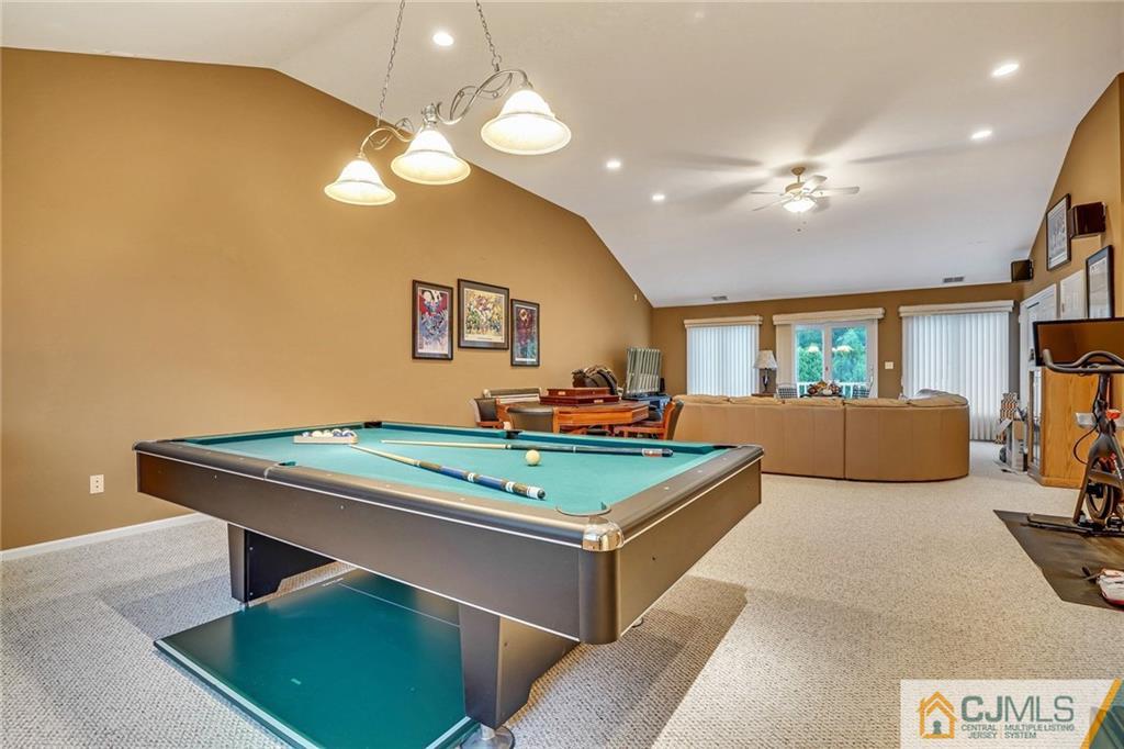 60 Higgins Road Old Bridge, NJ 08857 - Photo 14 of 25 a room with furniture and a flat screen tv