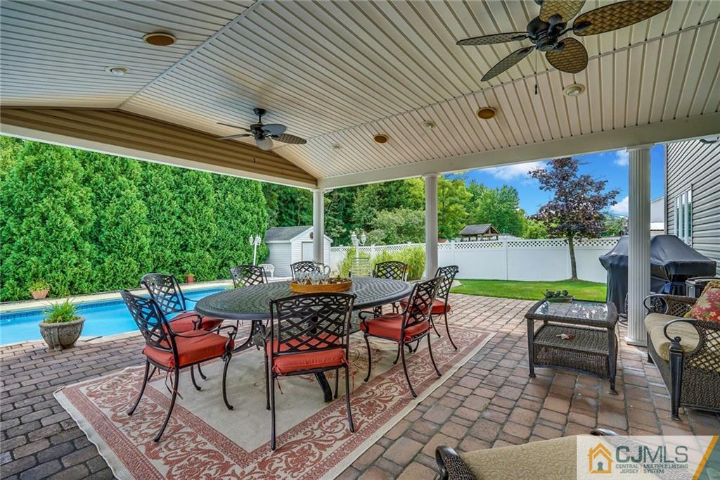 60 Higgins Road Old Bridge, NJ 08857 - Photo 21 of 25 a outdoor space with lots of furniture and garden view