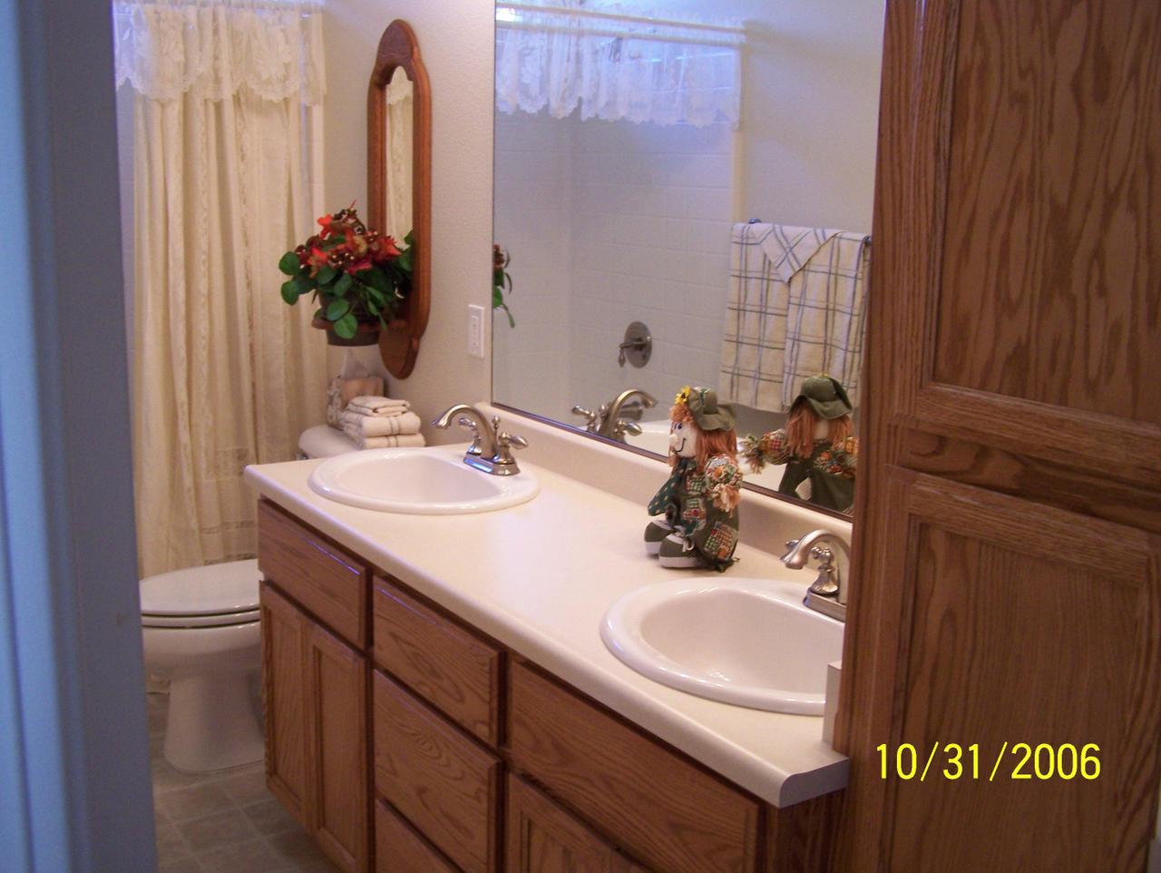 2354 Suzette Avenue Redding, CA 96002 - Photo 11 of 14 a bathroom with a sink and a mirror