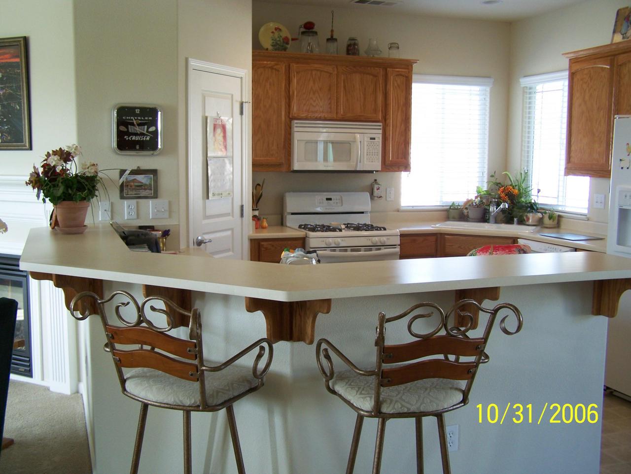 2354 Suzette Avenue Redding, CA 96002 - Photo 3 of 14 a kitchen with a sink cabinets and window