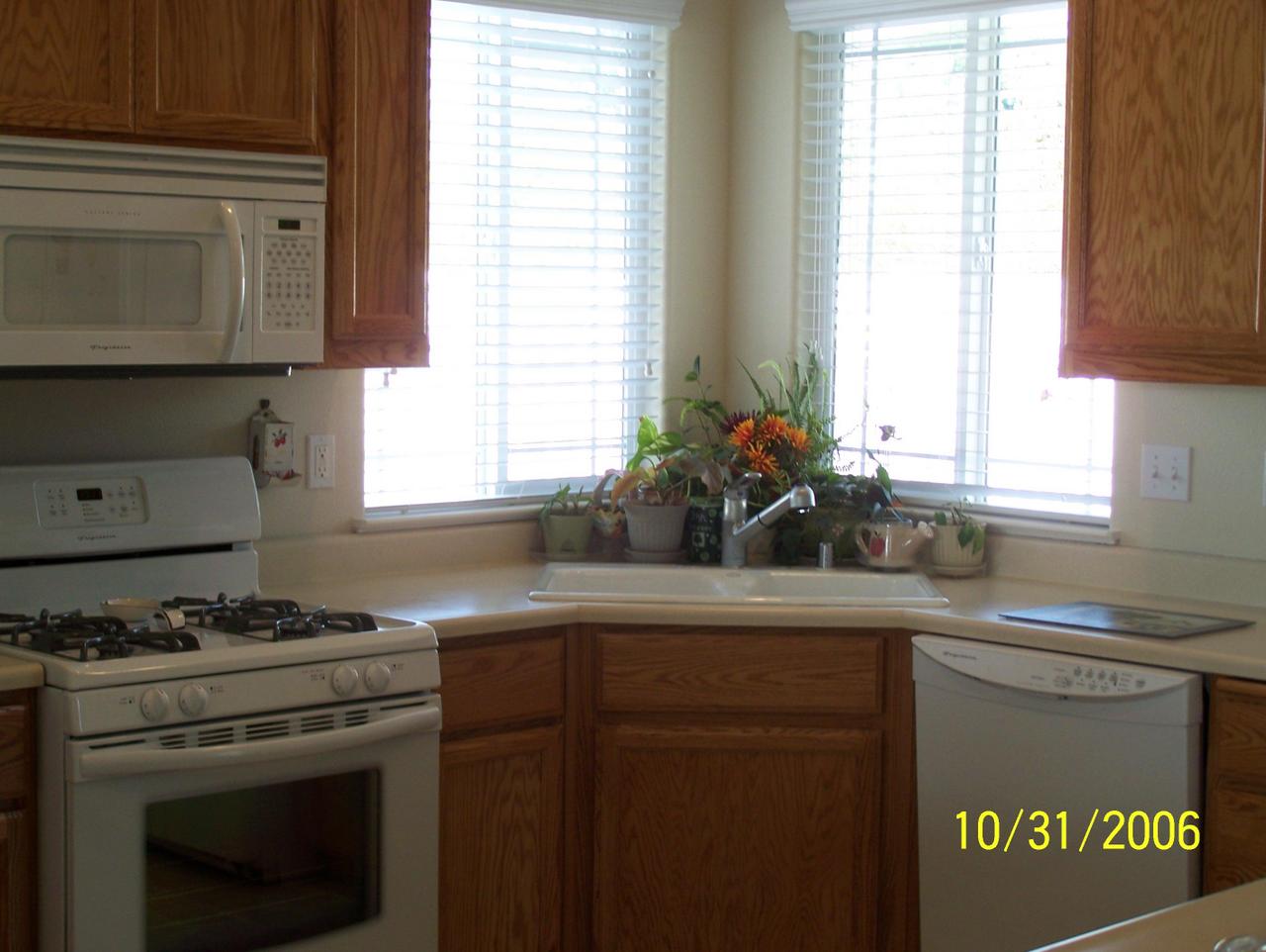 2354 Suzette Avenue Redding, CA 96002 - Photo 6 of 14 a kitchen with a stove and a sink