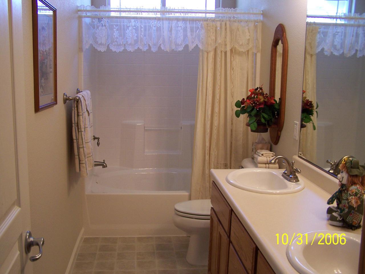 2354 Suzette Avenue Redding, CA 96002 - Photo 10 of 14 a bathroom with a sink toilet and shower
