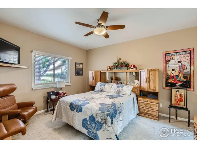 a bathroom with a sink double vanity granite tub shower and a mirror