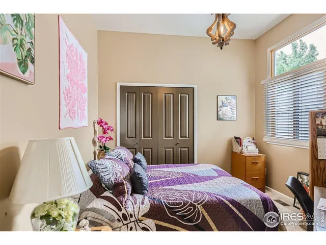 a bedroom with furniture and a bed