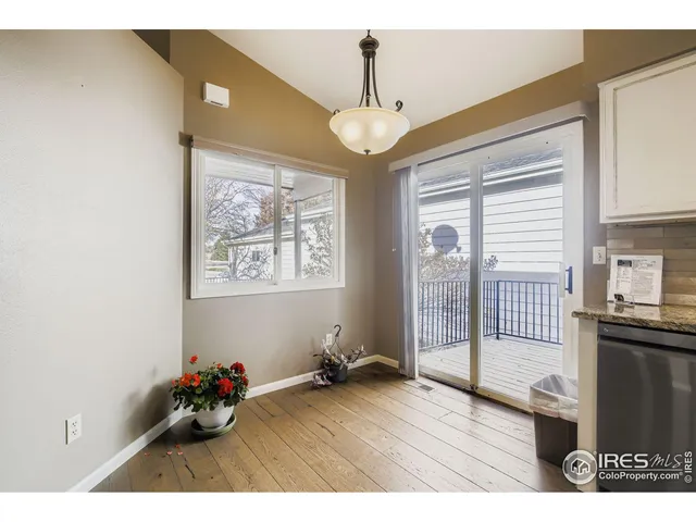 a workspace with furniture and window