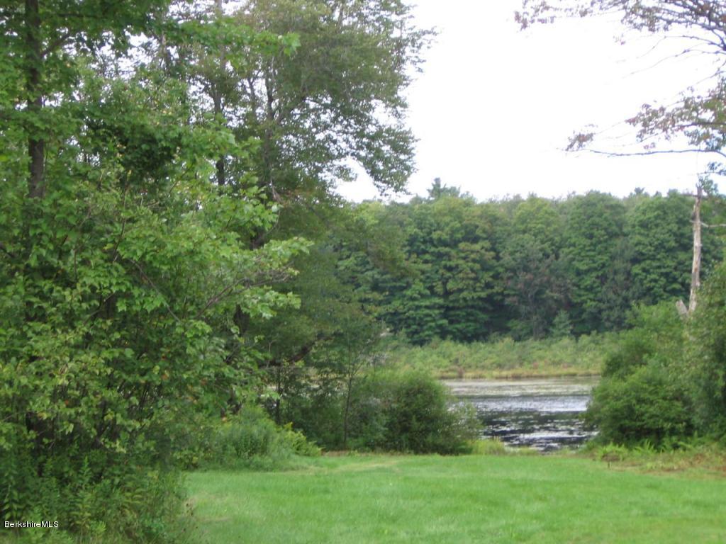 8.1-8.2 Stump Road Sandisfield, MA 01255 - Photo 2 of 9 a view of a field of grass and trees