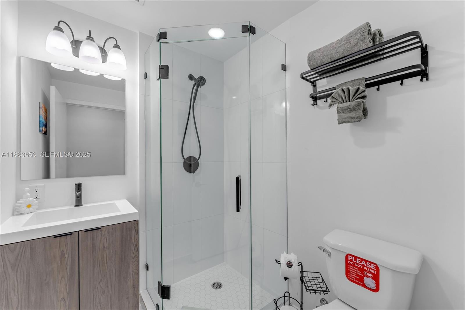 26144 Southwest 146th Court Homestead, FL 33032 - Photo 13 of 35 Modern first-floor bathroom with glass shower
