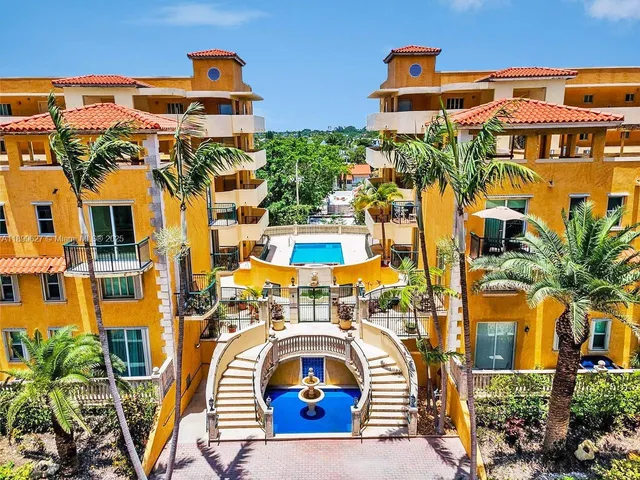 a picture of a building with garden view