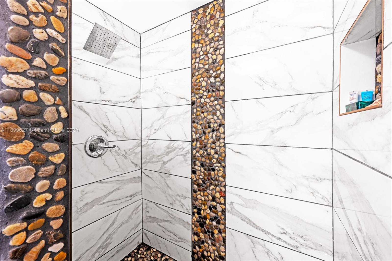 8888 Collins Avenue, Unit 113 Surfside, FL 33154 - Photo 13 of 22 a bathroom with a shower