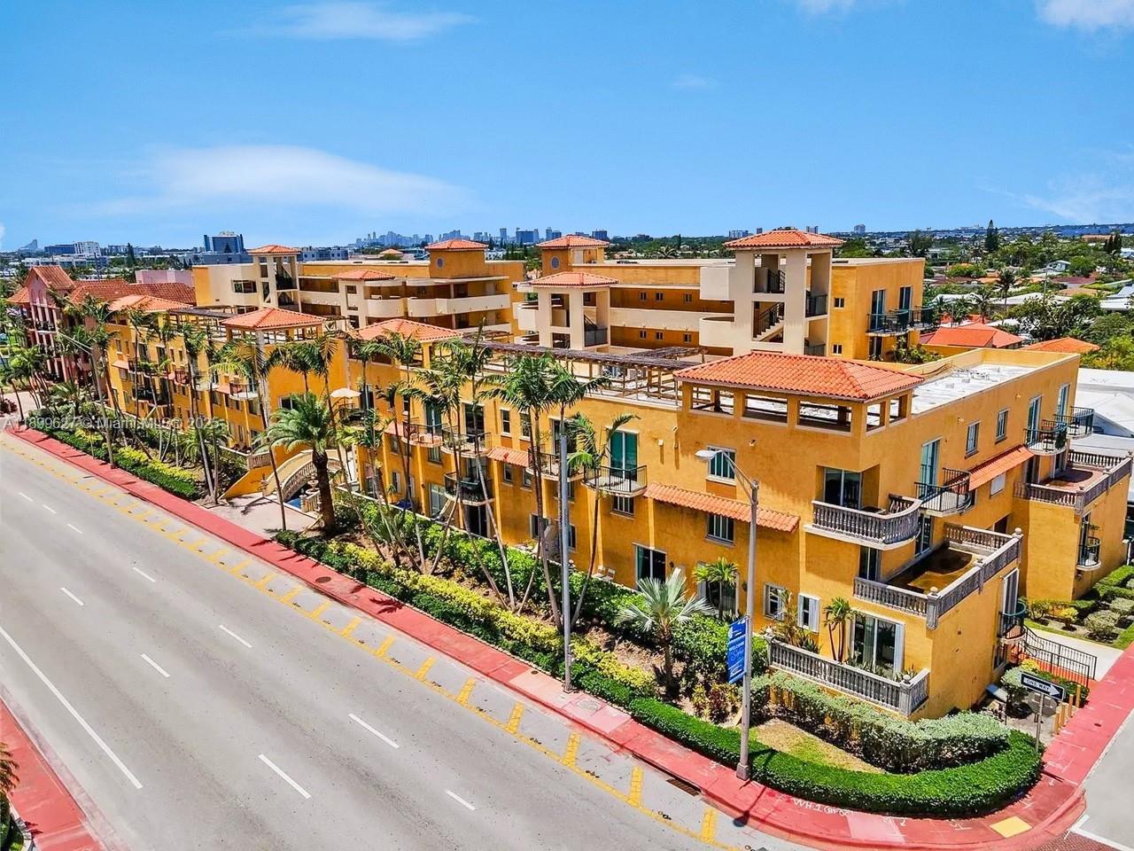 8888 Collins Avenue, Unit 113 Surfside, FL 33154 - Photo 20 of 22 a view of a city with tall buildings