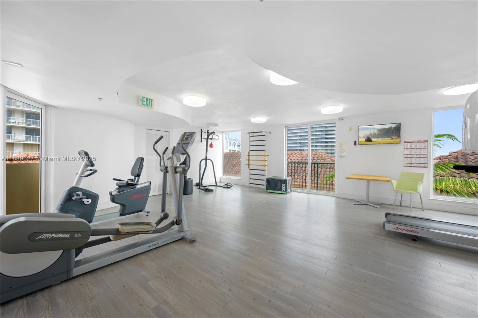 8888 Collins Avenue, Unit 113 Surfside, FL 33154 - Photo 22 of 22 a view of a room with gym equipment