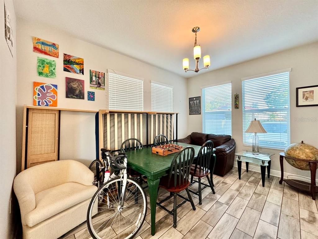 2951 West Cherry Street Tampa, FL 33607 - Photo 13 of 25 a view of a dining room with furniture window and outside view