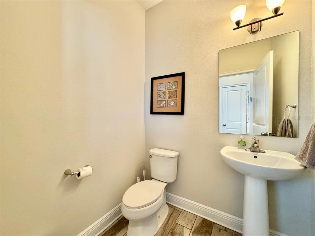 2951 West Cherry Street Tampa, FL 33607 - Photo 14 of 25 a bathroom with a sink and mirror