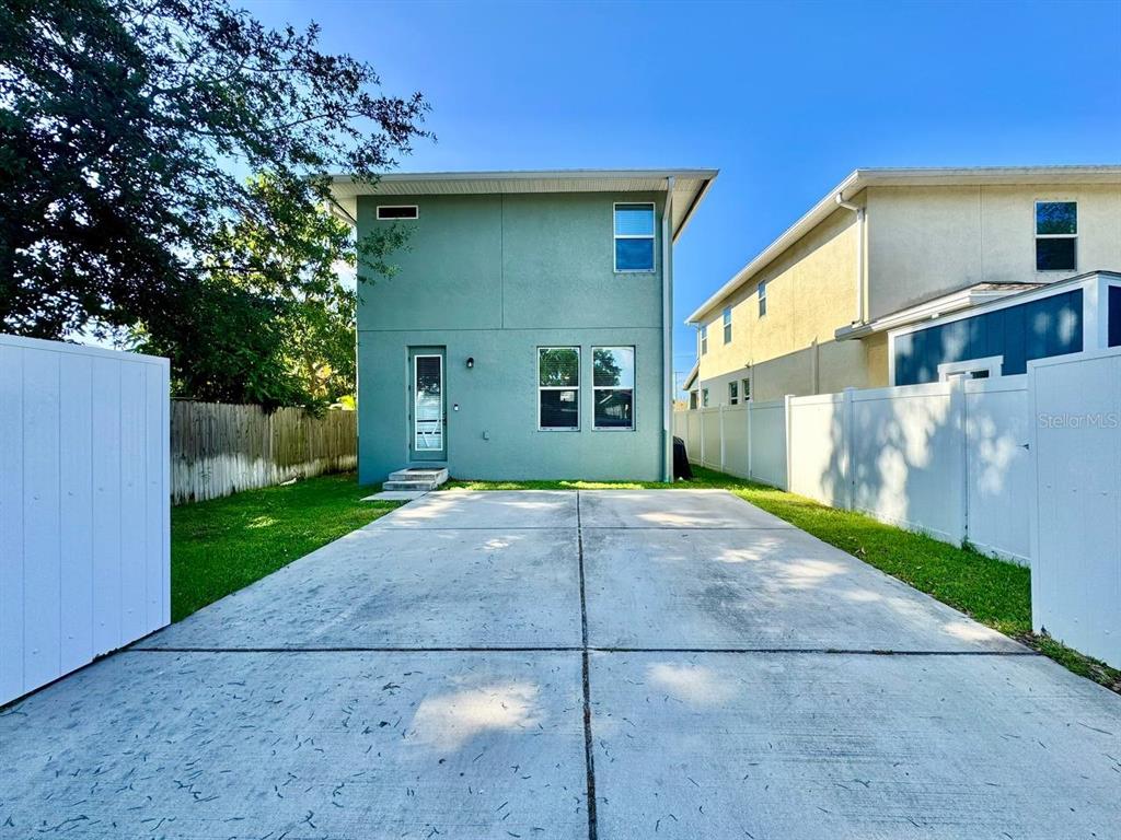 2951 West Cherry Street Tampa, FL 33607 - Photo 25 of 25 a front view of a house with garden